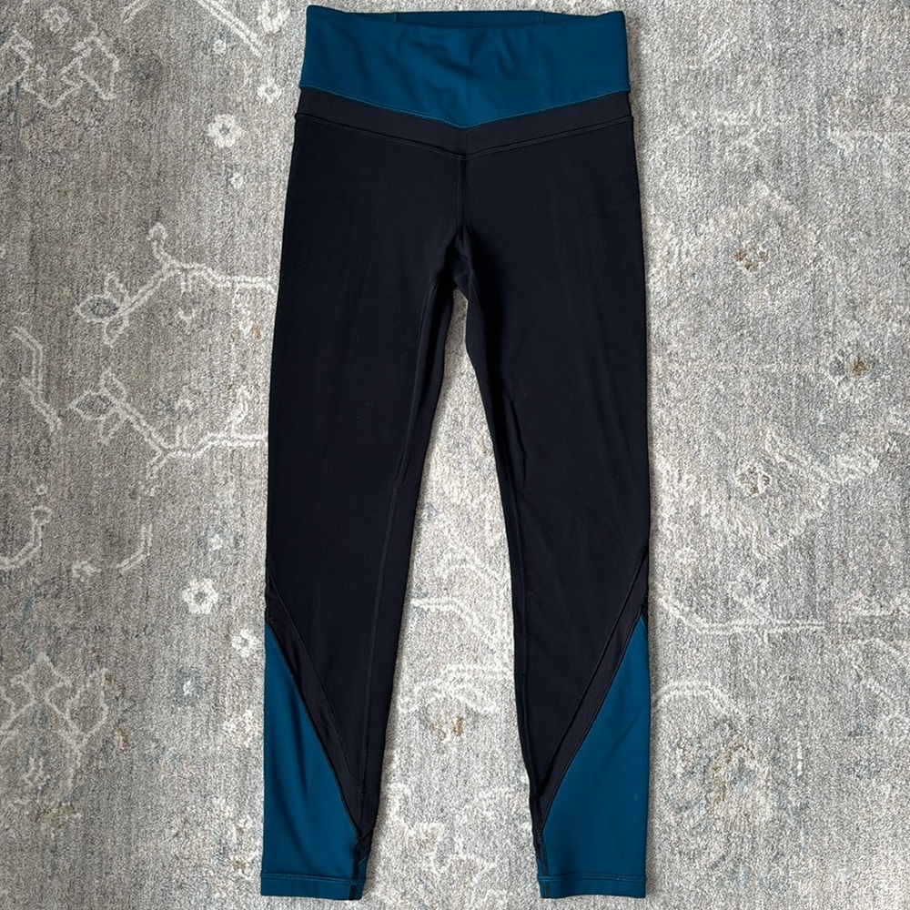Athleta elevation 7/8 tight with mesh inset